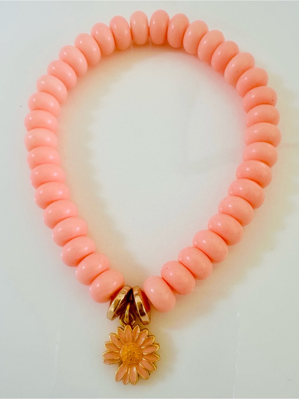 Pink Beaded Stretch Bracelet with Gold Daisy Charm